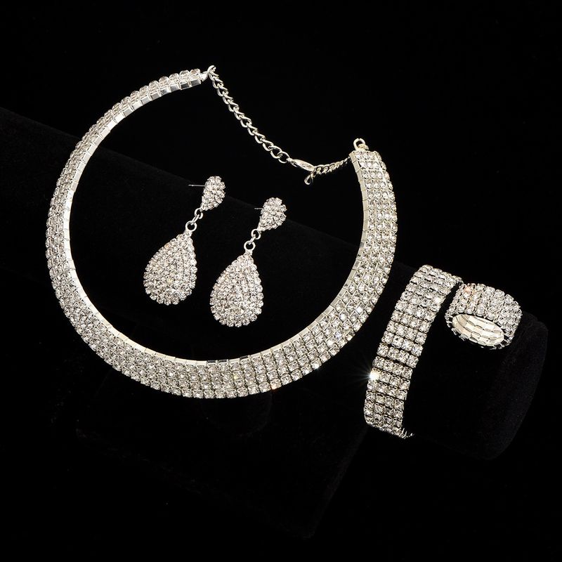 Waterdiamanten sieradenset - 4-delige zilveren ketting, oorbellen, armband en ring voor bruiloft en fotografie, elegant bruidscadeau_voghion.com
