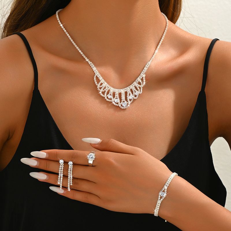 Mode Volledige Diamant Zirkoon Elegante Bruiloft Sieraden Ketting Oorbellen Armband Ring Vierdelige Set Voor Banket_voghion.com