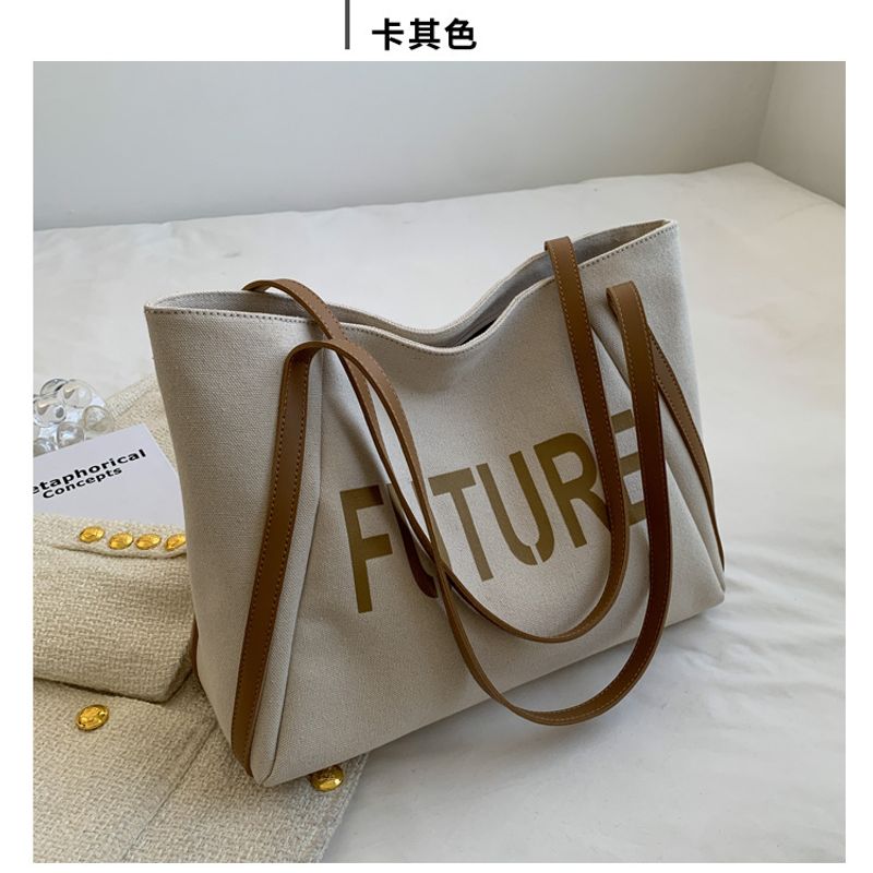 Sac fourre-tout décontracté en toile de grande capacité pour femmes, nouvelle collection 2025, à bandoulière simple, pour les déplacements quotidiens et les étudiants_voghion.com