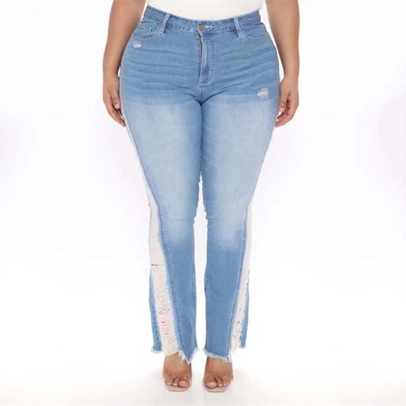 Jeans bootcut a vita alta effetto consumato da donna - Pantaloni in denim elasticizzato azzurro con orlo grezzo, disponibili in taglie comode_voghion.com