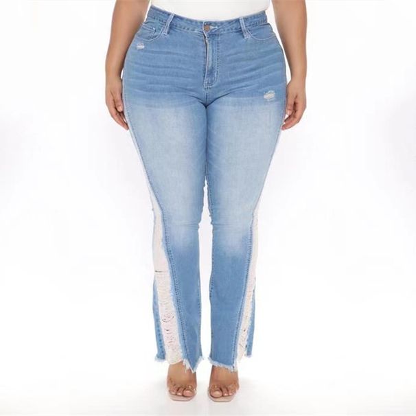 Jeans bootcut a vita alta effetto consumato da donna - Pantaloni in denim elasticizzato azzurro con orlo grezzo, disponibili in taglie comode_voghion.com