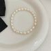 Armband aus natürlichen Süßwasserperlen, schlichte Retro-Mode, Reisperlen, echte Perlen, leichtes luxuriöses elastisches Armband_voghion.com