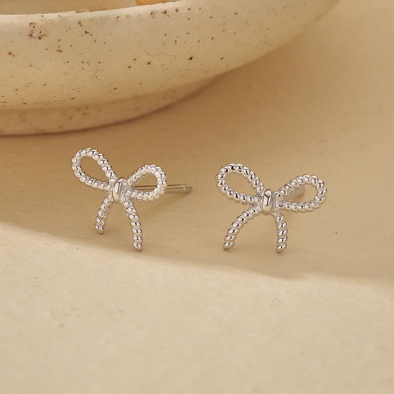 Orecchini da donna in argento sterling 925 con nodo a fiocco, eleganti e raffinati, regalo di lusso leggero, orecchini coordinati, temperamento elegante e carino._voghion.com