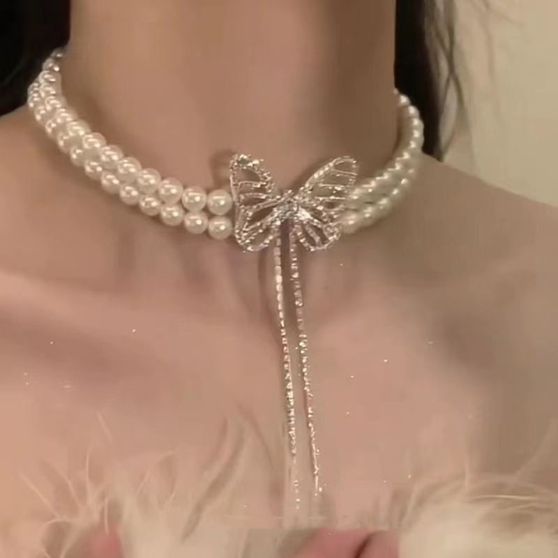 Novo colar de pérolas com dupla camada de laço feminino, design de nicho, colar de alta qualidade, temperamento versátil, corrente de clavícula_voghion.com
