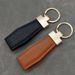 Portachiavi per auto in vera pelle con strato superiore, alla moda, con ciondolo in lega, creativo, per uomini e donne, con cordino in pelle._voghion.com