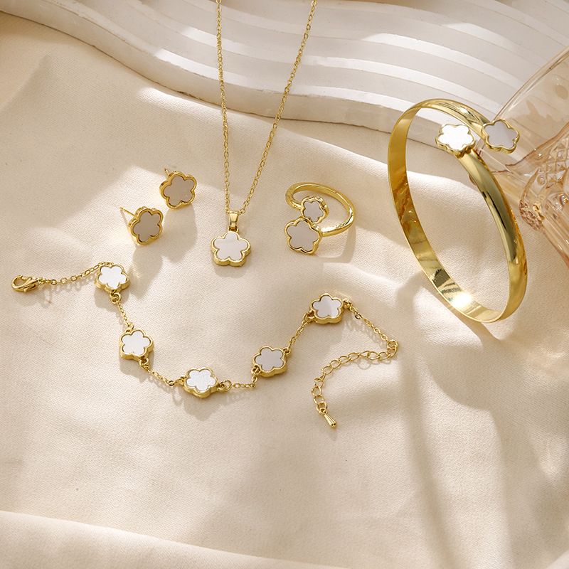 Hot Selling Bright Lucky Flower Jewelry Set Acrylic Bracelet Bracelet Five Leaf Clover Necklace Ring Earrings Female_voghion.com