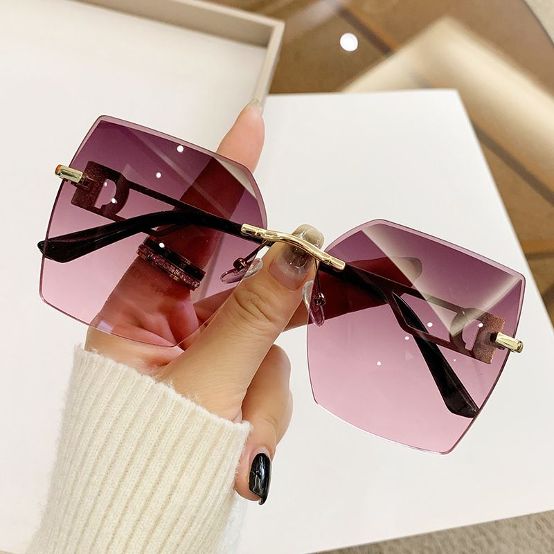 Women's trend rimless cut edge fashion driving travel glasses advanced feeling sunglasses_voghion.com