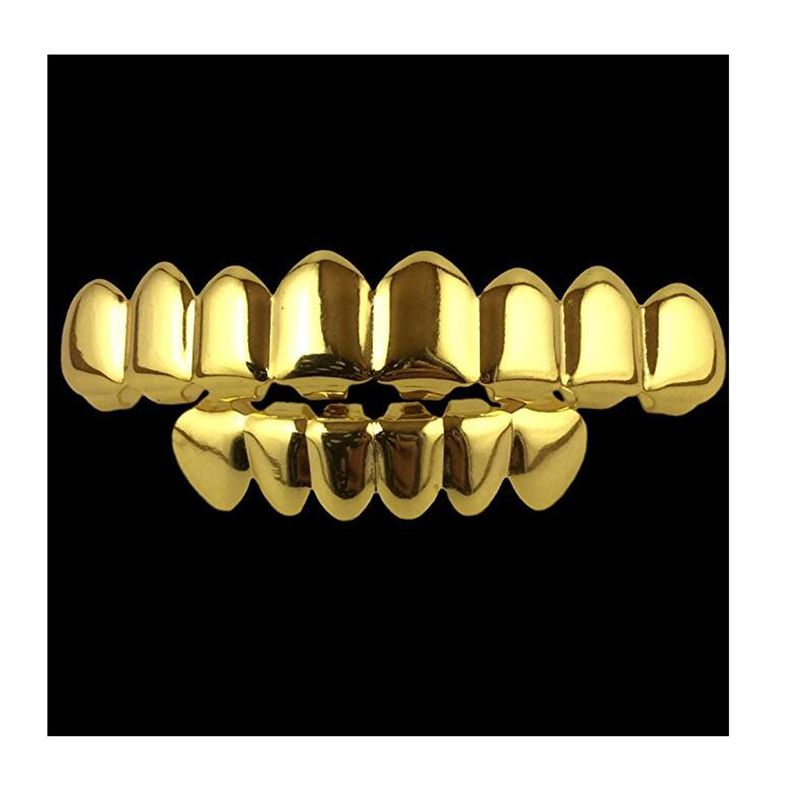 2024 Novo conjunto de dentes de hip hop europeu e americano de venda quente tendência de moda banhado a ouro 8 dentes conjunto de dentes de ouro conjunto de dentes de Halloween grelhadores adereços_voghion.com