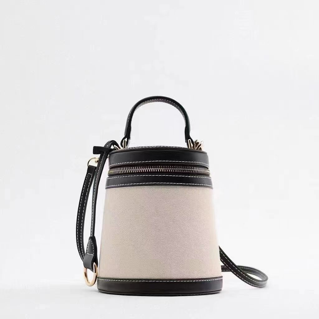 Damen Taschen Frühling Neue zylindrische Kontrastfarbe Box geformt Mini Bucket Bag Crossbody Schulter Canvas Handtasche Trend_voghion.com