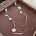 Collana da donna versatile alla moda, con catena per clavicola, stile bohémien, con conchiglia quadrata irregolare e ciottoli._voghion.com
