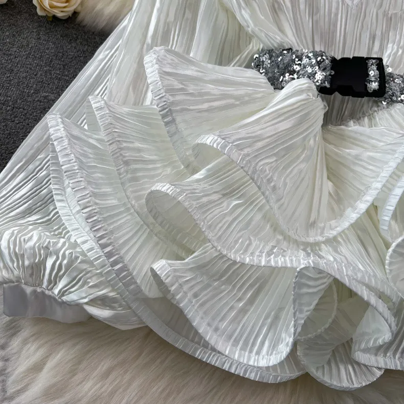 Vêtements pour femmes Costume à la mode, tempérament féminin, chemise brillante à manches longues et col en V avec ourlet en feuille de lotus pour femmes, jupe à paillettes taille haute_voghion.com