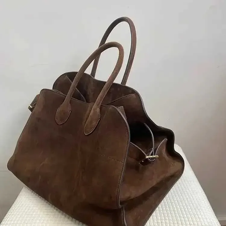 2024 Carteras de viaje retro de gran capacidad con diseño de nicho de alta calidad para damas, paquete nuevo de otoño e invierno_voghion.com