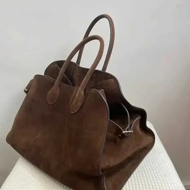2024 Carteras de viaje retro de gran capacidad con diseño de nicho de alta calidad para damas, paquete nuevo de otoño e invierno_voghion.com