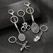 Unisex Creative Pendant Sports Serie Alloy Keychain Auto Pendant Keychain Dekoratioun_voghion.com