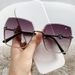 New frameless cut edge women's fashion, with a large metal frame and gradient purple light sunglasses for driving_voghion.com