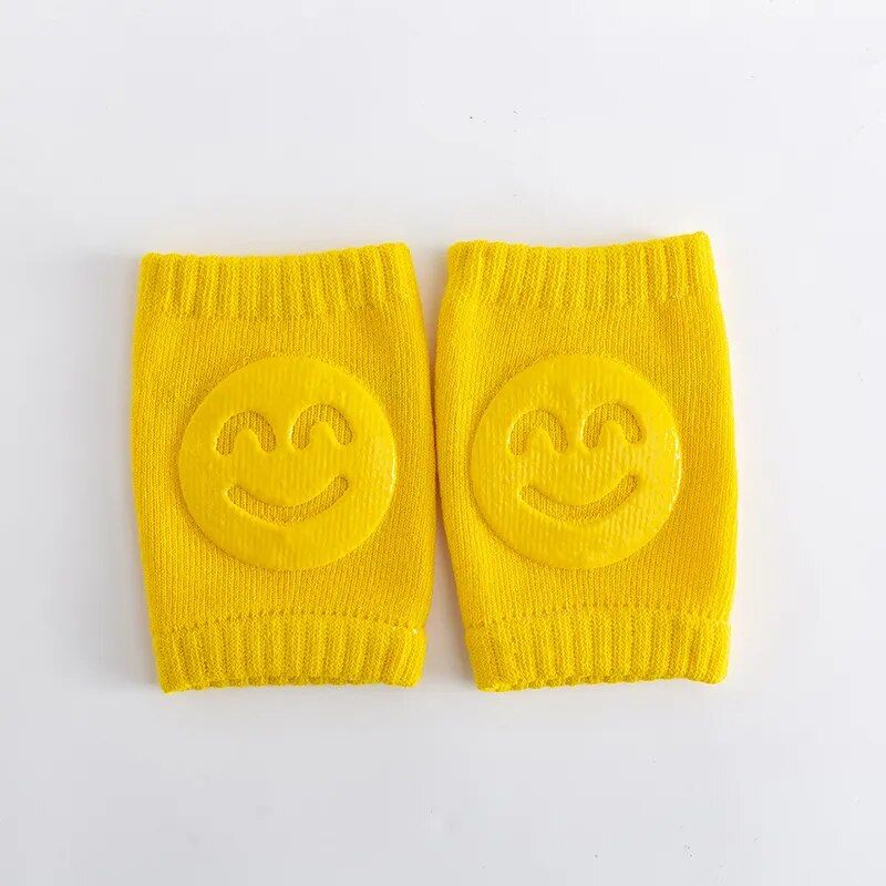 Calzini in spugna autunnali per neonati, gomiti per bambini che gattonano, ginocchiere con viso sorridente_voghion.com