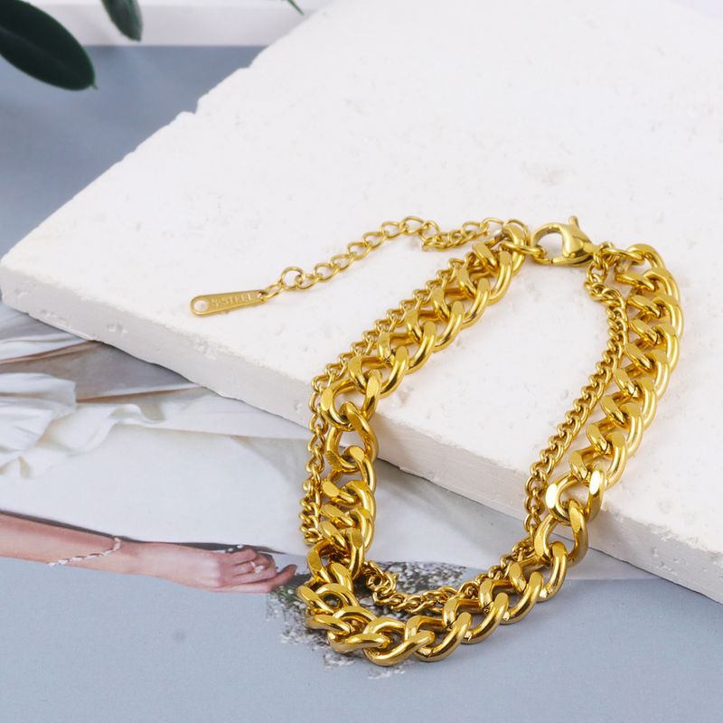 Bracciale cubano in acciaio al titanio placcato oro a doppio strato, semplice e versatile._voghion.com