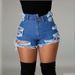 Women's fashion high-waisted ripped hem jeans_voghion.com