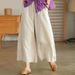 Pantaloni da donna estivi e primaverili a gamba larga oversize dritti tinta unita elasticizzati in vita abbinati con tasche superiori con cavallo profondo e nono_voghion.com