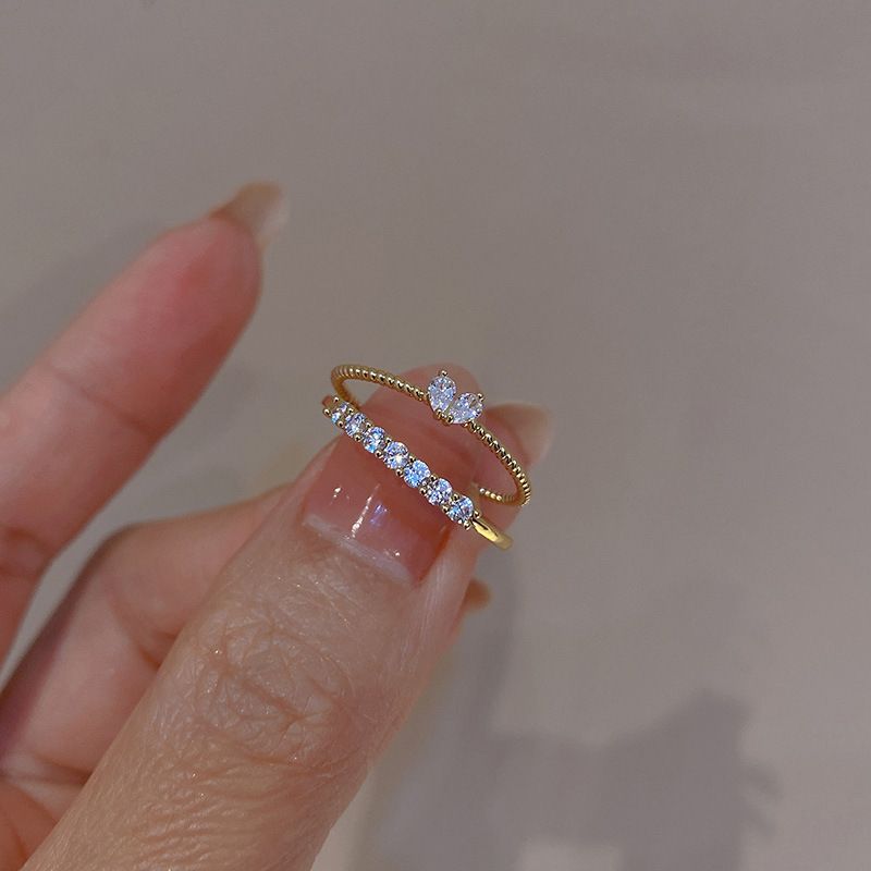Bague unisexe tendance en forme de cœur avec strass incrustés et ouverture en forme de cœur de pêche_voghion.com