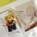 Taschenanhänger, Cartoon-Welpen-Anhänger, Taschenanhänger, kleines rotes Buch, süßer kleiner Bär, lockige Plüschpuppe, geflochtenes Seil, Schlüsselanhänger_voghion.com