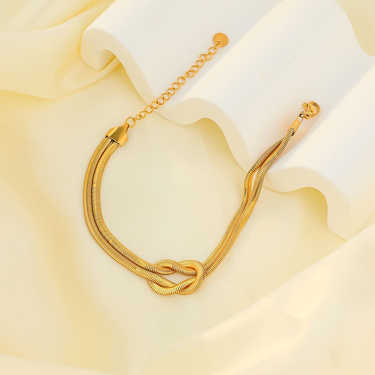 Bracciale da donna in acciaio al titanio con osso di serpente appiattito, collana in conchiglia dorata, placcato elettroliticamente e intarsiato con zirconi a quattro colori, set di braccialetti personalizzati_voghion.com