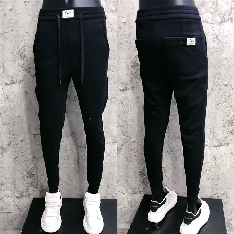 Pantalon homme tendance, coupe slim, style décontracté, idéal pour les petits pieds. Pantalon de survêtement élastique polyvalent à lacets._voghion.com