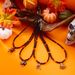 Collana di perline di miglio all'ingrosso, accessori di Halloween in stile gotico scuro europeo e americano, collana con clavicola, zucca, gatto e ragno per le donne_voghion.com