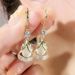 High-End Cat's Eye Stone Geometric Niche Light Luxury Elegant Face-Slimming Water Drop Earrings Clips Ear Jewelry For_voghion.com
