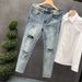 Herrenbekleidung High-End-zerrissene Slim-Jeans für Herren, verwaschene blaue Neun-Punkt-Hose, trendige Herrenmarke, trendige, hübsche Röhrenhose_voghion.com