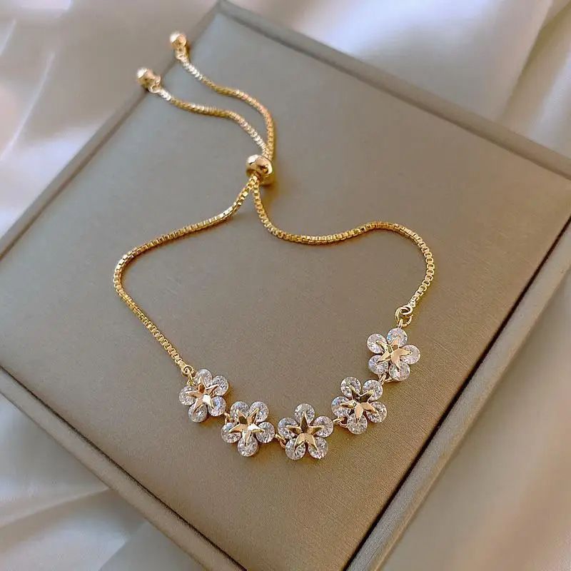 Bracciale con fiore in strass intarsiato, push-pull, per donna, design di nicchia, personalità di Internet, pentagramma a petalo_voghion.com