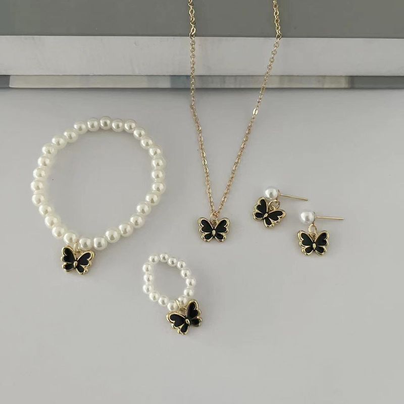 Beliebte Kinder Schmuck Set Öltropfen Schmetterling Anhänger Perle Armband Ohrringe Halskette Zubehör weiblich_voghion.com