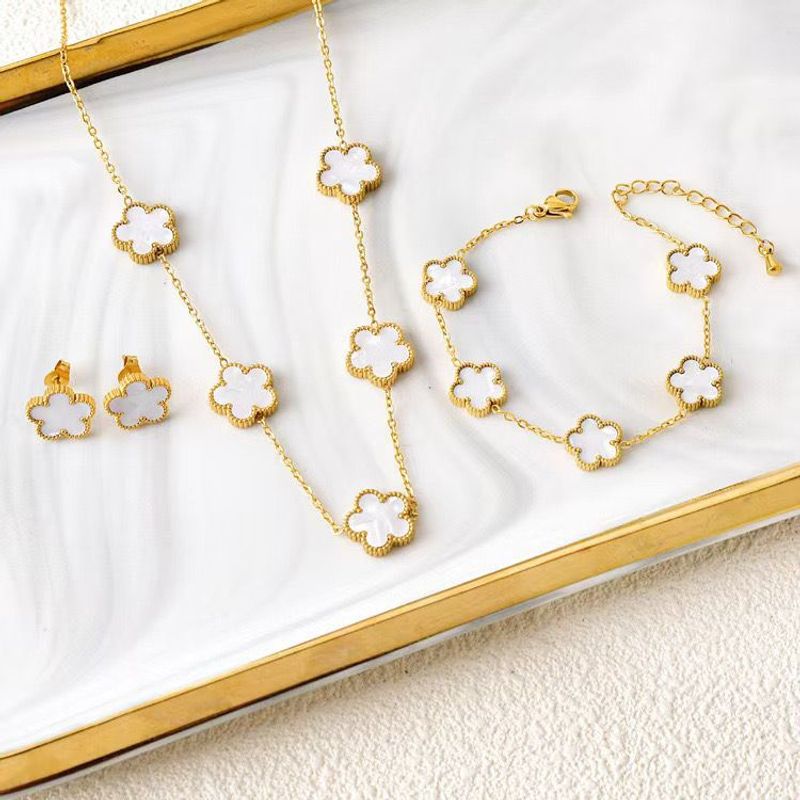Nuovo set di tre pezzi in acciaio al titanio anti-scolorimento, bracciale, collana, orecchini, moda versatile, nuovo regalo di alta qualità_voghion.com