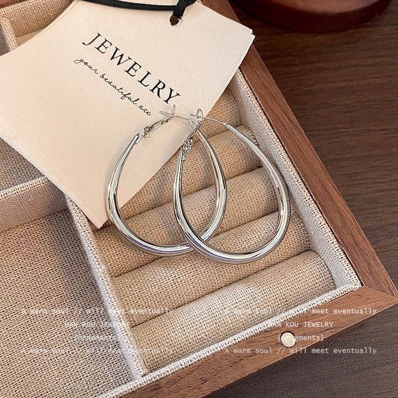 Elliptical plain circle suitable for square faces, women's light luxury high-end earrings, cold and exaggerated style,_voghion.com
