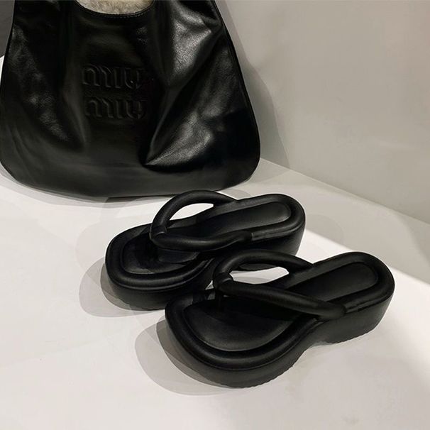 Europäesch an amerikanesch Flip-Flops mat héijen Absätz fir Fraen, mat décker Sohlen, fir d'Héicht an d'Gefill vum Trëppelen op Dreck ze erhéijen, EVA Flip-Flops_voghion.com