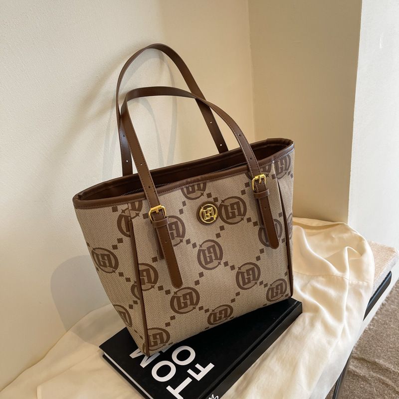 2023 Nieuwe Hot Selling Jacquard Premium Vrouwen Tote Bag Grote Capaciteit Uitgaande Handtas Veelzijdig Temperament Vrouwen Schoudertas_voghion.com