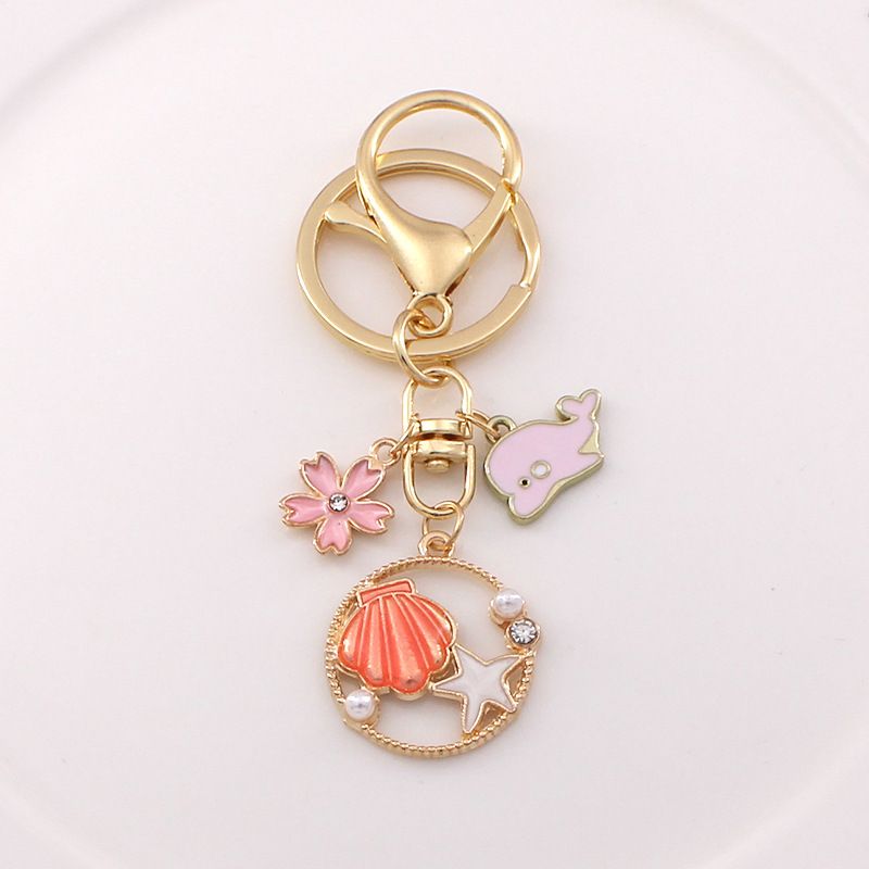 Portachiavi per auto con ciondolo a forma di delfino e stella marina, stile cartone animato coreano e giapponese, personalizzato e creativo, per studenti._voghion.com