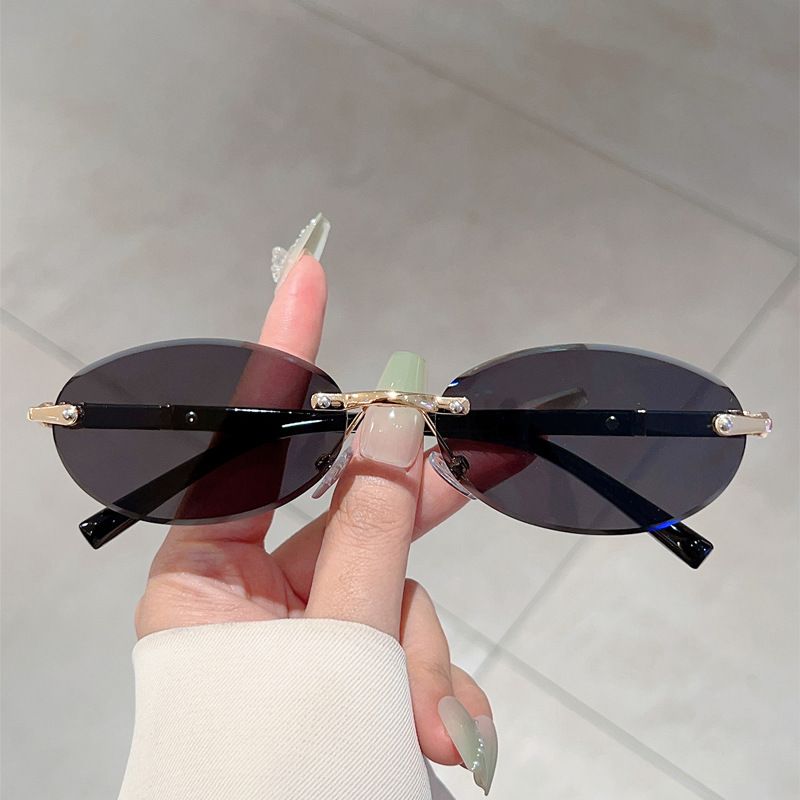 New Frameless Edged Oval Small Frame Fashion Trendy Internet Celebrity Style High-end Sunglasses_voghion.com