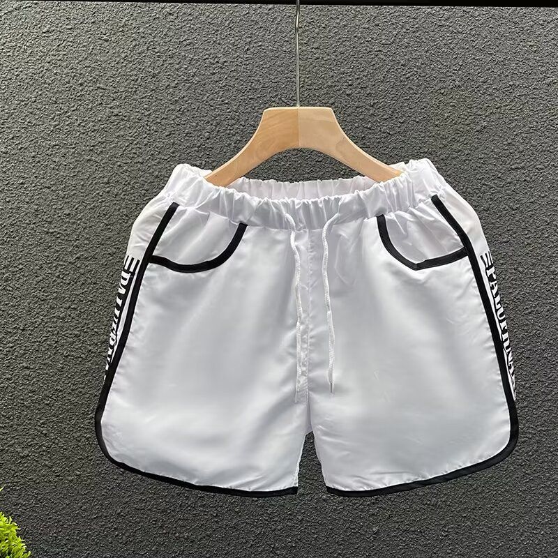 Pantaloncini da uomo estate 2024 nuovi pantaloni da spiaggia ad asciugatura rapida pantaloni sportivi casual da ragazzo larghi sottili 3 punti_voghion.com