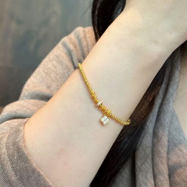 Gold shop with four-leaf clover diamond running ring abacus bead bracelet gold new exquisite bracelet for a long time does not fade_voghion.com