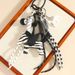 Whimsical Zebra-Print Pony Keychain – Stylish PU Leather Charm With Black Braided Rope (Maximalist Bag Accessory)_voghion.com