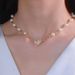 Collana di perle a forma di cuore con design di nicchia, collana di perle, collana di catena per clavicola retrò francese di alta qualità_voghion.com