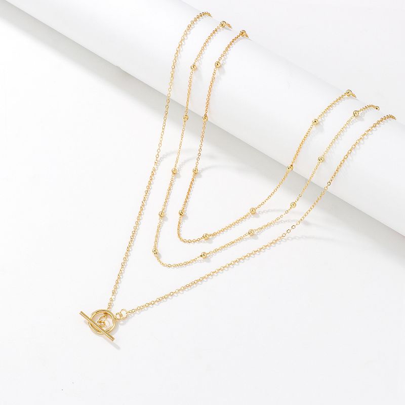 Cadena de suéter apilada de tres capas, collar largo chapado en oro de alta gama, cadena de clavícula versátil para otoño e invierno para mujer_voghion.com