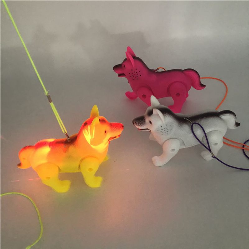 Juguete eléctrico de paja con forma de perro con música brillante y diseño de lobo para el mercado nocturno de los niños_voghion.com