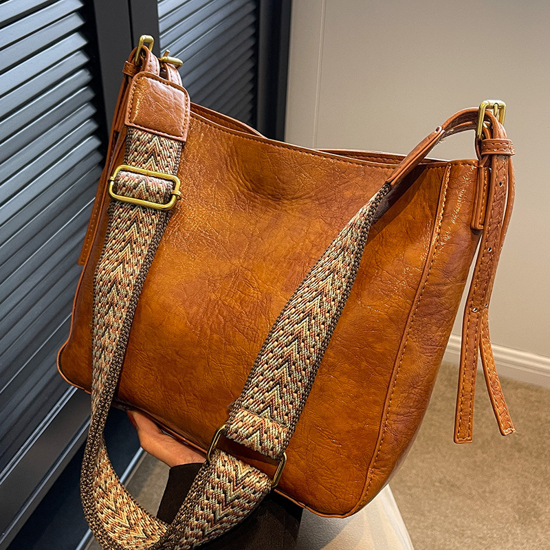 Large capacity bag, versatile for women in spring and summer 2024, new texture broadband crossbody bag, women's bucket bag, commuting tote_voghion.com