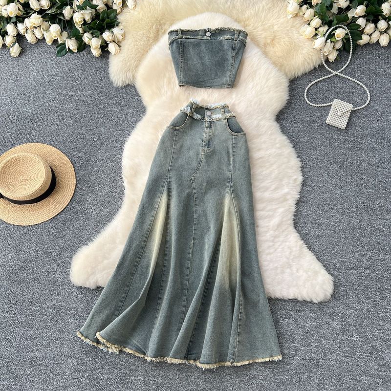 Îmbrăcăminte de damă Tinuta de fată fierbinte Feminin cu margine brută Top fără mâneci Vestă cu talie înaltă Fusta coadă de pește Costum din denim din două piese_voghion.com