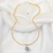 Original high-definition version gold and silver color matching round carved bean chain pearl pendant niche personality sweater chain female advanced_voghion.com