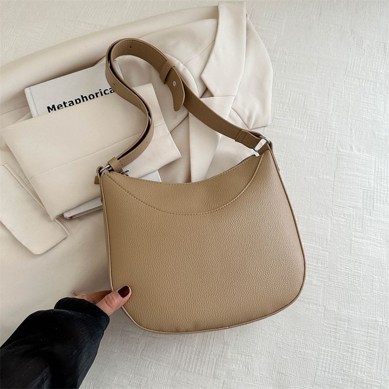 Einfarbige Textur und minimalistische Einzelschulter Damen 2024 Frühjahr neuer vielseitiger Instagram Crossbody-Wassereimer für_voghion.com
