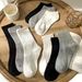 2025d Solid Color Black White Gray Mid-Calf Trendy Versatile Simple Breathable Short Unisex Sports Long Socks_voghion.com