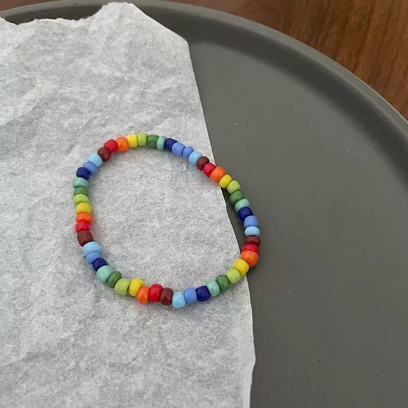 Braccialetto con orso sorridente arcobaleno, senso di nicchia femminile, fatto a mano, con perline, elastico, coppia, gioielli all'ingrosso_voghion.com